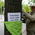 Dėl medžių kirtimo giriose – teatralizuota protesto akcija Vilniuje