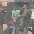 Izraelio karys gumine kulka šovė į surištą palestinietį
