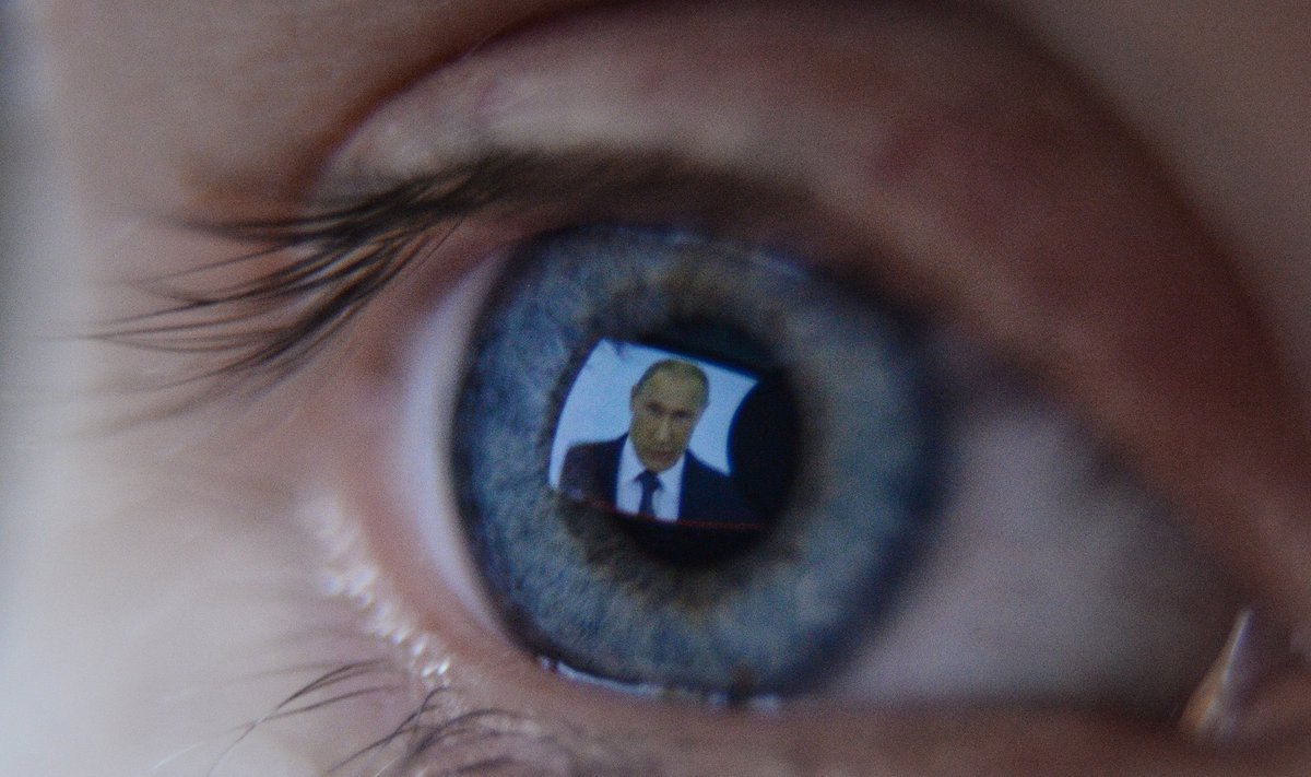 Vladimir Putin on a TV set