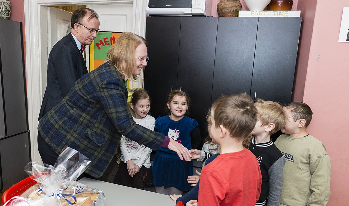 Finnish Ambassador Michelsson and Mrs Ebba Michelsson with some of the children in the kindergarten   Photo © Ludo Segers @ The Lithuania Tribune