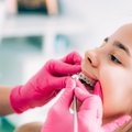 Kreivi vaiko dantys – ne tik estetinė problema: kada apsilankyti pas ortodontą, kad netektų brangiai mokėti už sudėtingą gydymą