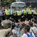 Tarp Honkongo protestuotojų išpopuliarėjo „FireChat“ žinučių programa