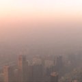 Kinija penktą dieną dūsta nuo tiršto smogo