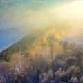 Huajingo kalną apgaubė debesys ir šerkšnas