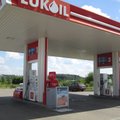 Lithuanian president vetoes cuts to anti-trust fines, saying they benefit Russia's Lukoil