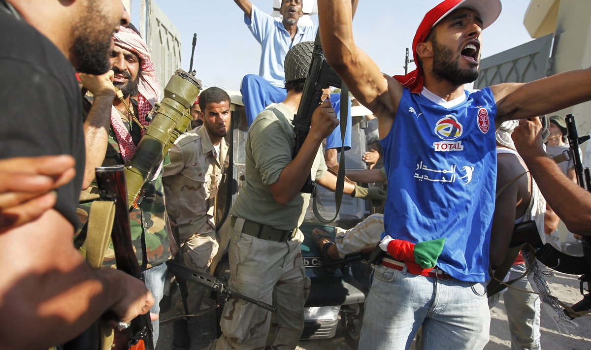 Libijoje sukilėliai švenčia pergalę