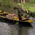 Ekologiškas pašto pristatymas Vokietijoje: kanalais plaukiančia valtimi