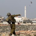 Izraelis privalo atšaukti visus naujakurius iš palestiniečių rajonų, sakoma JT ataskaitoje