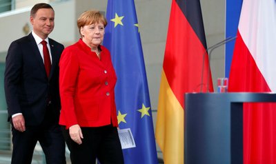 Angela Merkel ir Andrzejus Duda 