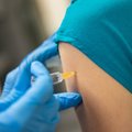 Литва: за год получено 6808 сообщений о побочных реакциях после прививки от COVID-19