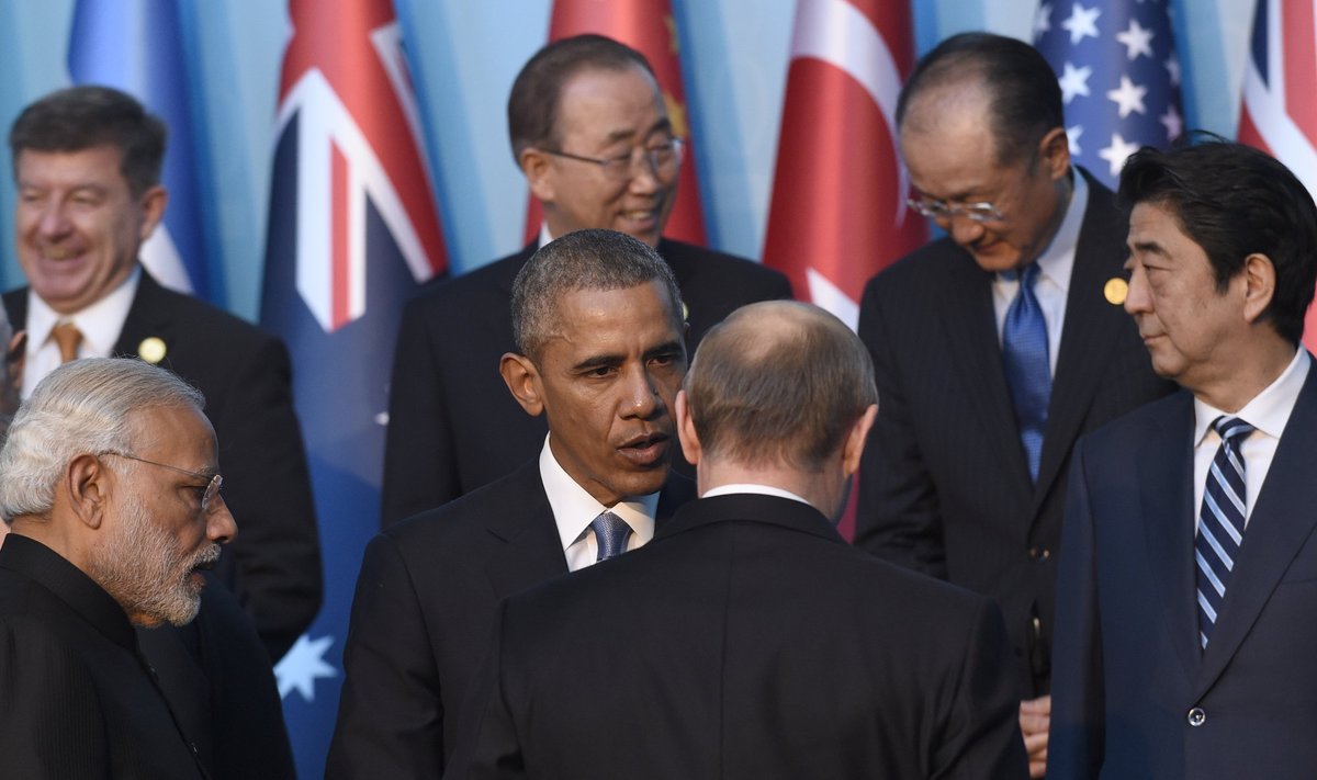B. Obama ir V. Putinas pralaužė ledą šešių sekundžių susitikimu