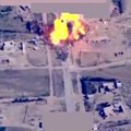Vaizdo įraše - efektinga ataka iš oro prieš ISIS šarvuotą automobilį