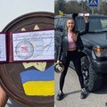 Militos Daikerytės rankose – oficialus ukrainietiškas savanorio dokumentas: įteiktas už pagalbą nuo karo nukentėjusiems žmonėms