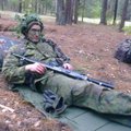 Lietuvos lengvaatlečiai sportinę aprangą iškeitė į kariškių uniformas