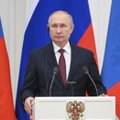 Putinas paragino Macroną užbaigti transliuotojo RT diskriminaciją