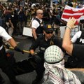 Vašingtone surengtos nedidelės neonacių eitynės nublanko prieš oponentų demonstraciją