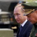 Politologas: taip bandoma atitolinti V. Putino režimo krachą