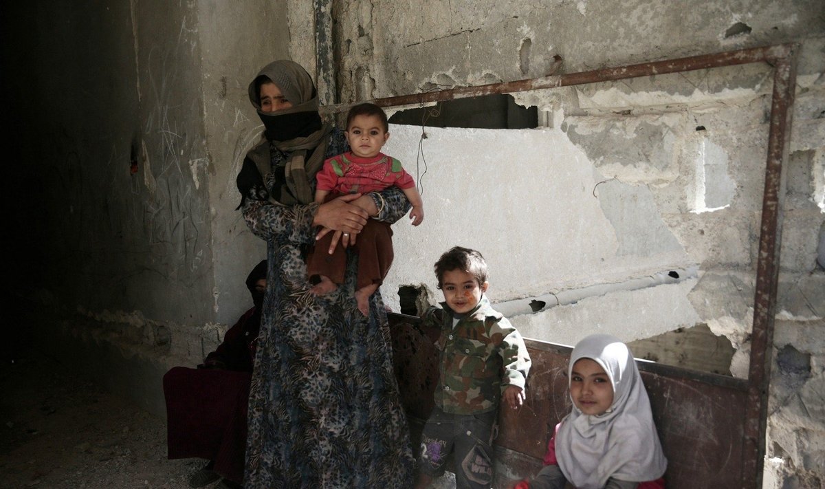 Sirijoje iš apsupto miesto netoli Damasko pasitraukė 620 sukilėlių