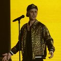 Dėl gerbėjų elgesio supykęs J. Bieberis metė mikrofoną ir nulipo nuo scenos