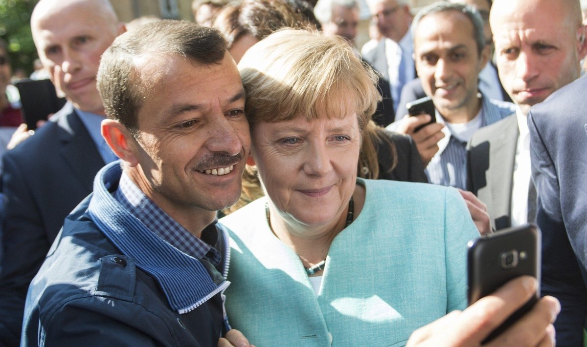 A. Merkel's selfy with a refugee 