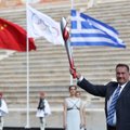 Graikija perdavė olimpinę ugnį Pekino žaidynių organizatoriams