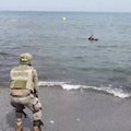 Apsirišęs plastikiniais buteliais berniukas atplaukė į Ispaniją