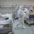 Dėl perpildytų ligoninių Rumunija sunkius COVID-19 pacientus siunčia į Vengriją