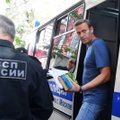 Navalnui gresia baudžiamieji kaltinimai „šmeižtu“