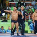 Ant olimpinio imtynių kilimo – mongolų „striptizas“
