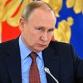 Britanija įspėja Putiną, kad jis gali būti teisiamas už karo nusikaltimus
