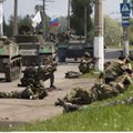 Ukraina: pripažinusi separatistų darinius Rusija pasitrauktų iš Minsko susitarimų