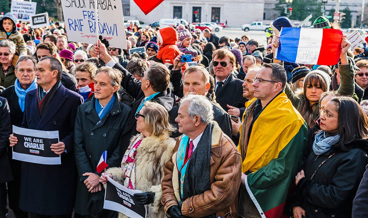 Lithuanian Ambassador Pavilionis draped in the Lithuanian flag joined Ukrainian Ambassador Motsyk and the French Ambassador Araud in the silent march  Photo Ludo Segers