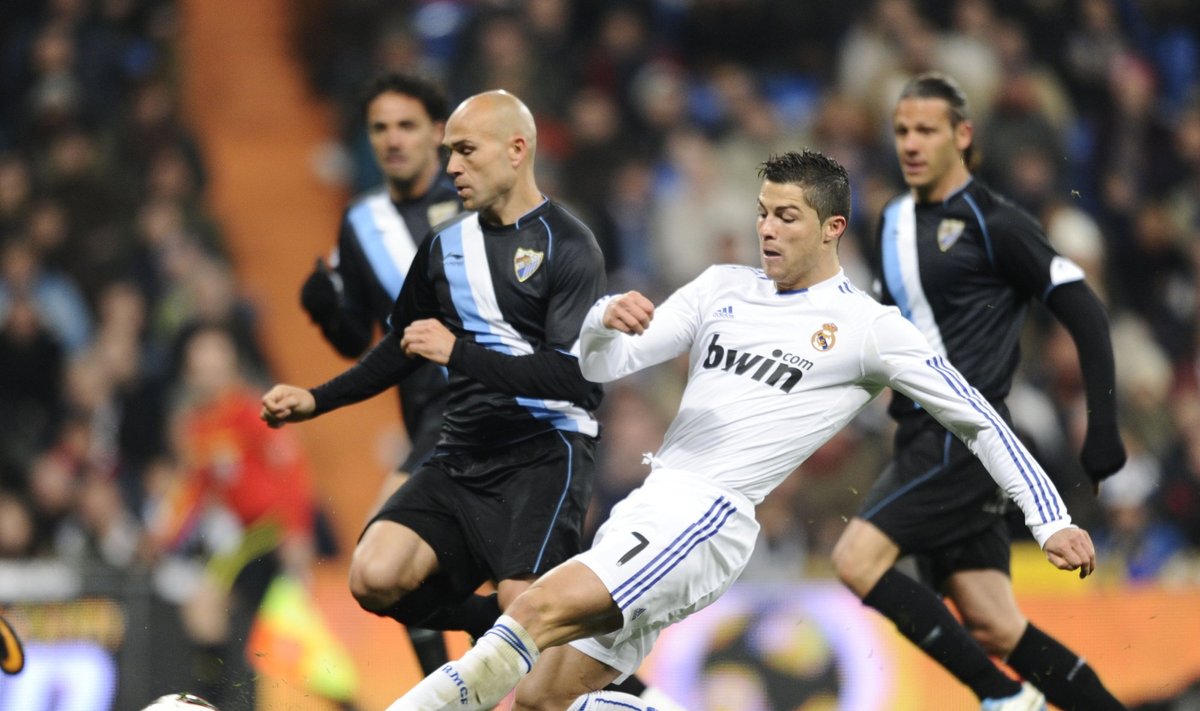 Cristiano Ronaldo ("Real") muša įvartį 