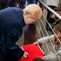 Grybauskaitė kviečia visus vaikus per atostogas rasti laiko atsiversti knygą