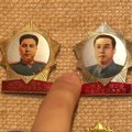 Kontrabandinė kolekcija: ženkliukai su Šiaurės Korėjos lyderių atvaizdais