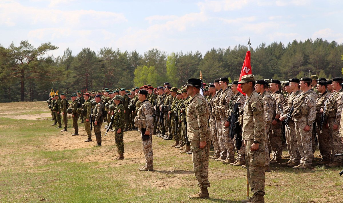 Soldiers stand at attention during the opening ceremony of Exercise HUNTER, a multinational anti-tank exercise,  Photo Captain Mark Ruban Public Affairs Officer Operation REASSURANCE Land Task Force