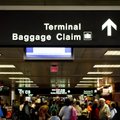 Įsigalioja naujos saugumo patikros taisyklės skrydžiams į JAV