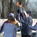 Olimpinis deglas nešamas per Sočį