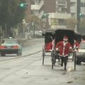 Tokijuje Kalėdų seneliai dirba rikšomis