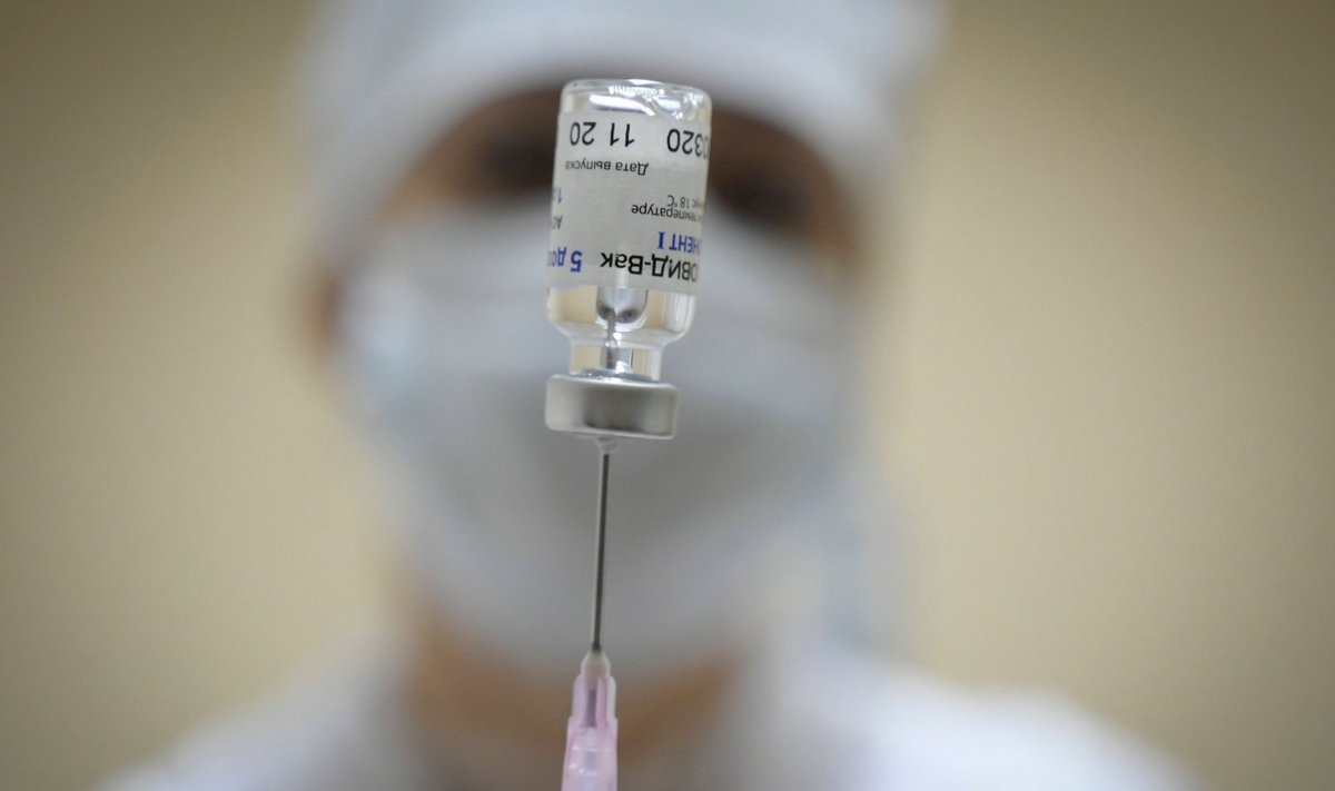 A nurse prepares dose of the Sputnik V (Gam-COVID-Vac) Covid-19 vaccine for a patient at a clinic in Moscow on December 30, 2020, as the country started its vaccination campaign for people aged 60 and over, to fight against the spread of the novel coronavirus.