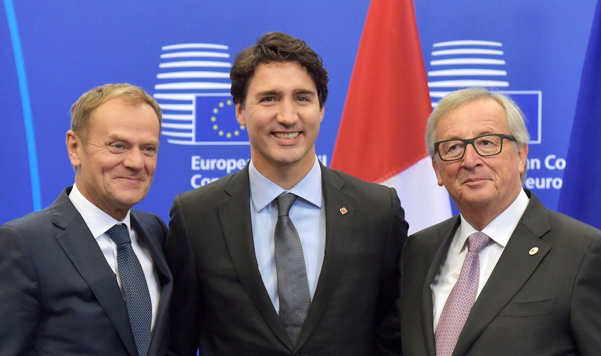 Donald Tusk, Justin Trudeau and Jean Claude Juncker after signing the CETA