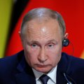 Rusų bankininkas turtą kraunasi plūsdamas Putino ekonominę politiką