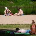 Šiltas oras žmones vilioja į paplūdimius: fotografas užfiksavo, kaip pramogauja lietuviai