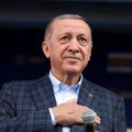 Pirmą kartą po sunegalavimo Erdoganas vėl pasirodė per TV
