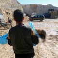 Sirijoje įtariamos dujų atakos aukų padaugėjo iki 58