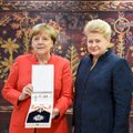 Lithuanian president bestows state award upon German chancellor