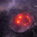 Įspūdingi vaizdai: iš Kilauea ugnikalnio išsiveržusi lava pasiekė vandenyną