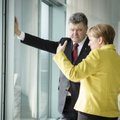 Меркель и Порошенко настаивают на перемирии в Донбассе
