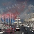 Į Prancūziją istoriniu laivu atplukdyta olimpinė ugnis – ceremoniją stebės 150 tūkst. žmonių