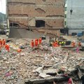 Kinijoje sugriuvus keliems namams žuvo 7 žmonės